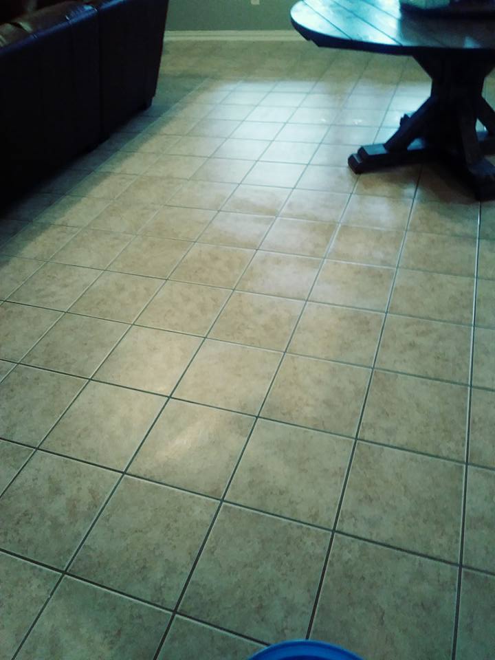 A person sitting on the floor of a room.