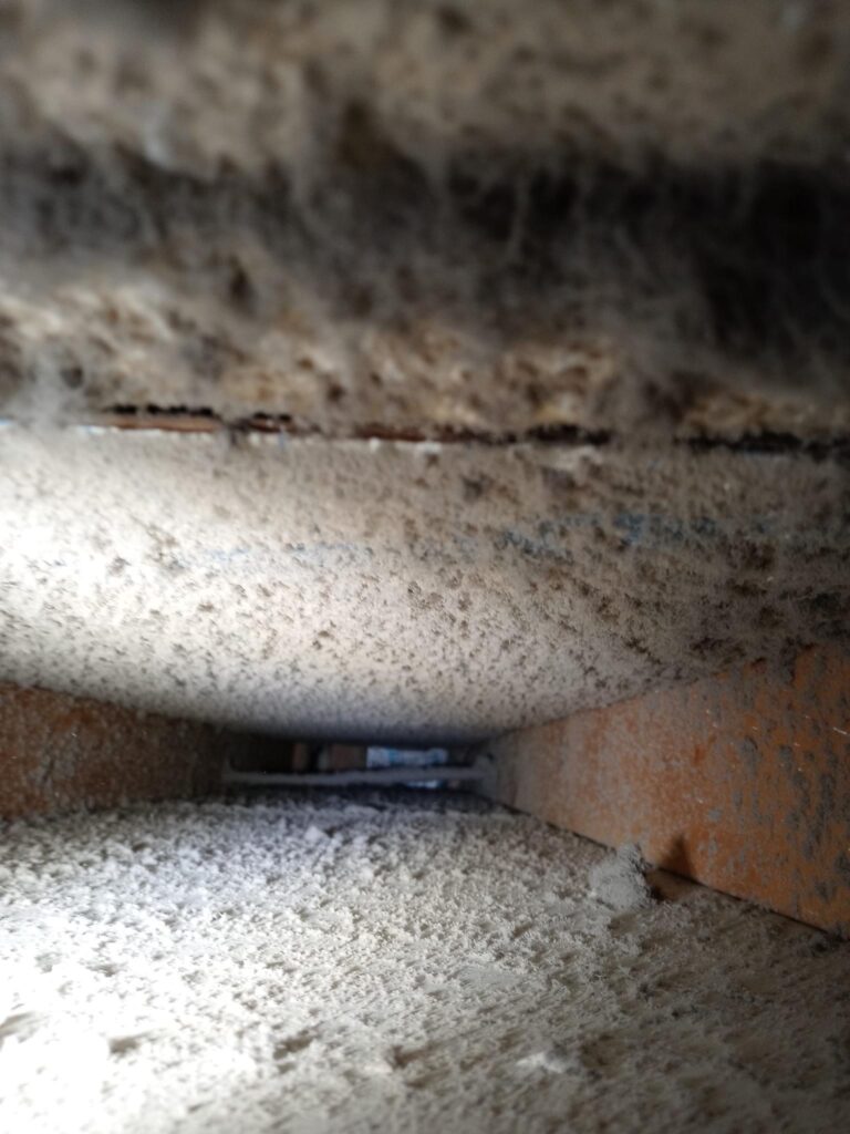 A close up of the inside of an air duct