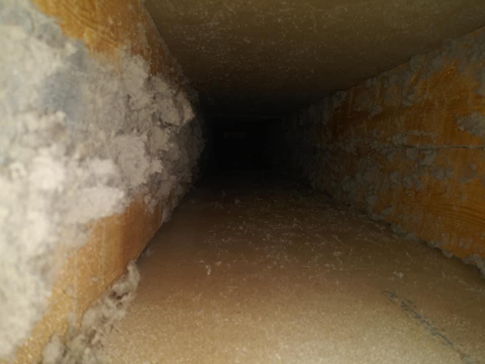A view of the inside of an air duct.